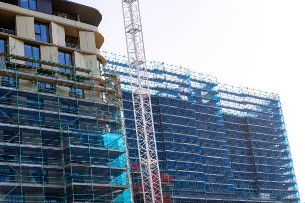 istock Construction of modern apartment building, background with copy space 1471486158