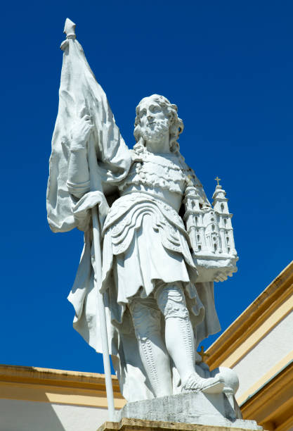 istock Historic Melk Abbey Sculpture With A Monastery In A Hand 1471486272