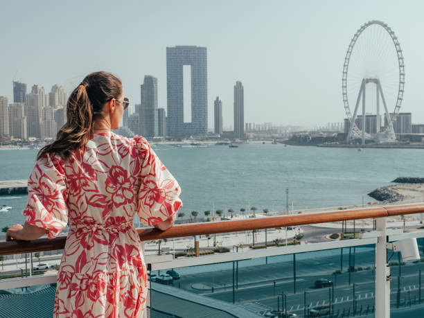 istock Fashionable woman standing on the empty deck 1471487358