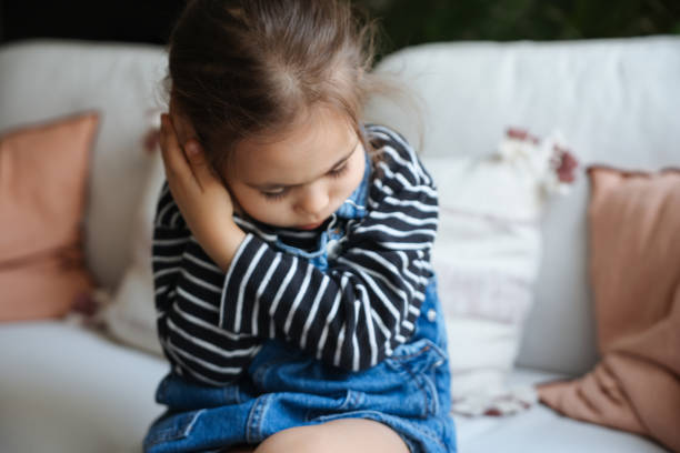 istock Little girl having an earache 1471489474