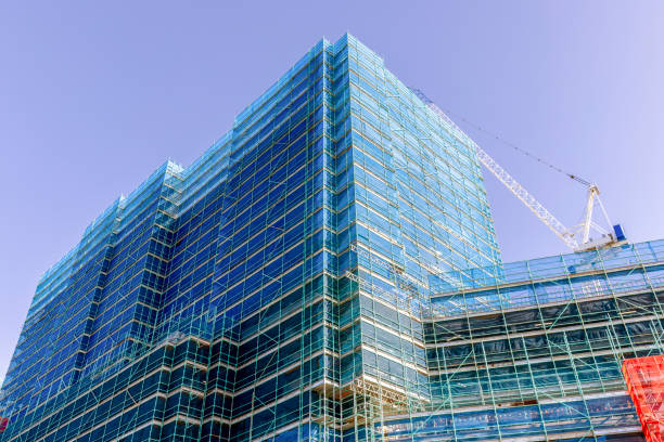 istock Construction of modern apartment building, background with copy space 1471490164