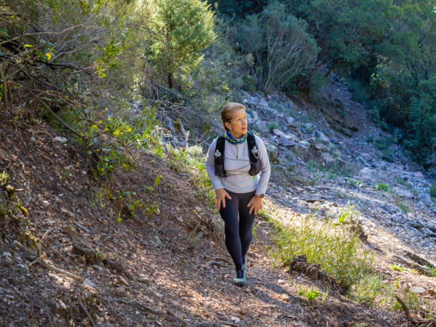 istock Athlete woman practicing trail running in the mountains 1471490792