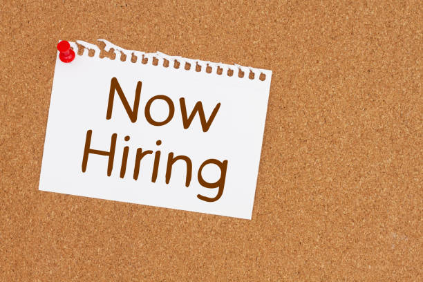 istock Now hiring message on card on a corkboard 1471491382