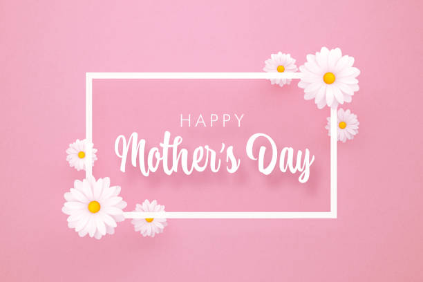 母の日のコンセプト – ピンクの背景に母の日のメッセージと白いヒナギク