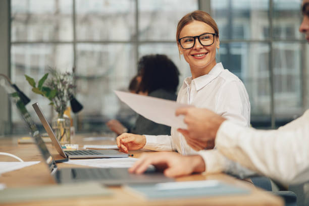 istock Business team is analysing new financial project while working together on office desk 1471492752