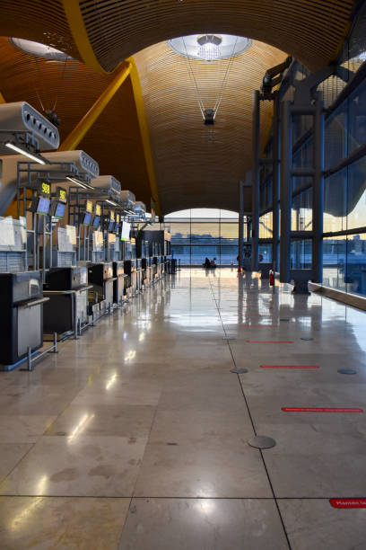 istock Terminal corridor check-in at Madrid Airport 1471494573