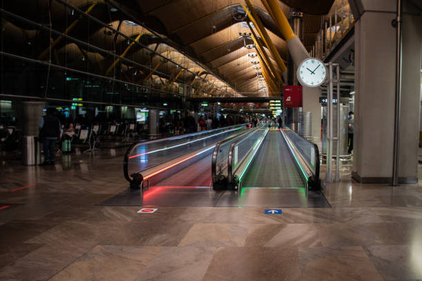 istock Empty moving sidewalk Madrid Airport at night 1471494590