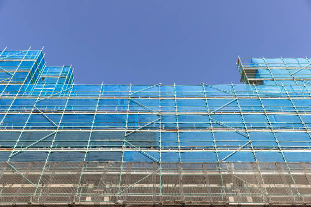 istock Construction of modern apartment building, background with copy space 1471495136