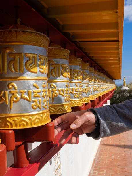 istock Spinning Buddhist prayer drums or prayer wheels at a monastery 1471496120