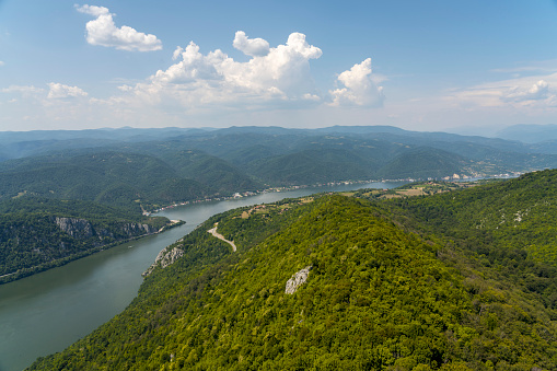 Panoramic view of Danube in Djerdap gorge from Serbian side on sunny day. View on Romania.