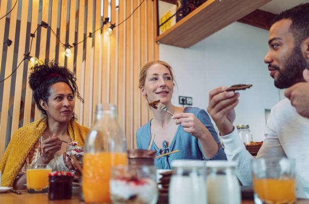 istock Small group of friends having breakfast together 1471506699
