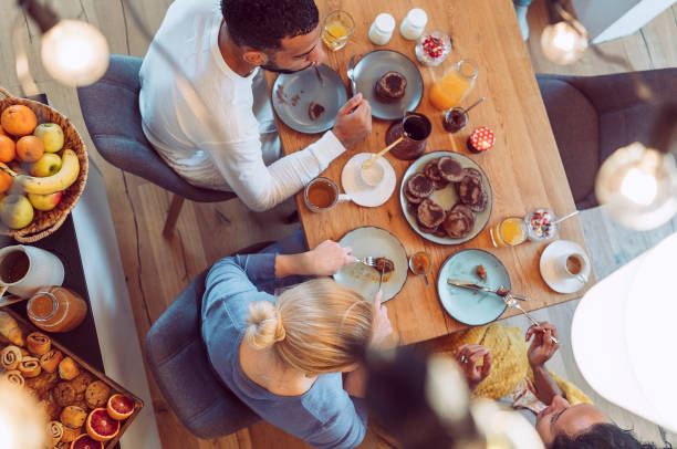 istock Small group of friends having breakfast together 1471506764
