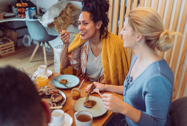 istock Small group of friends having breakfast together 1471507087