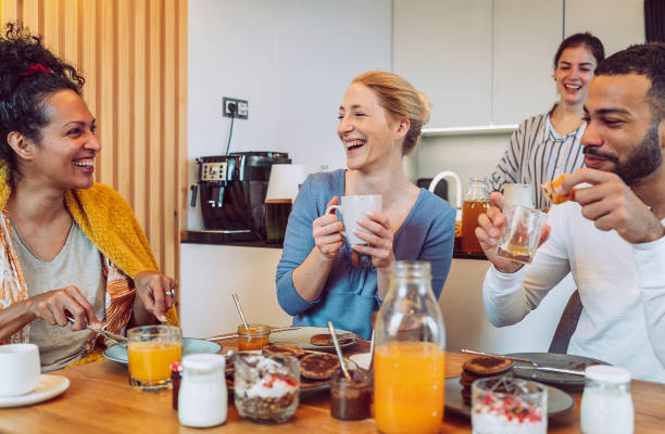 istock Small group of friends having breakfast together 1471507326