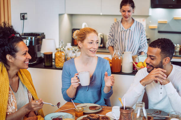 istock Small group of friends having breakfast together 1471507381