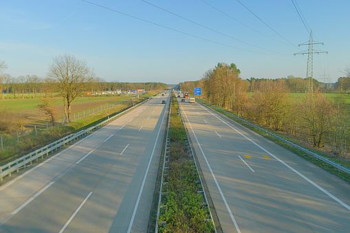 The autobahn in Germany, view from the bridge over the road, the movement of cars