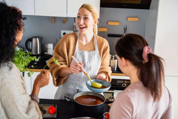 istock Small group of friends preparing food 1471508030