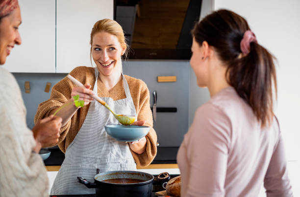 istock Small group of friends preparing food 1471508058