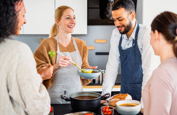 istock Small group of friends preparing food 1471508079