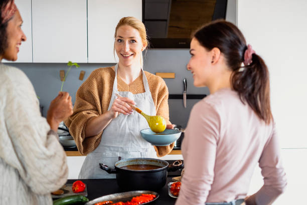 istock Small group of friends preparing food 1471508115