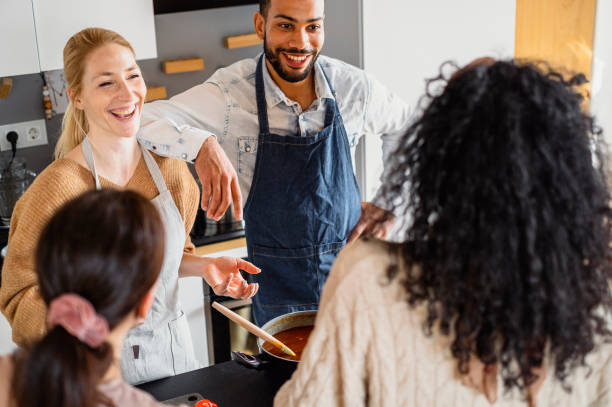 istock Small group of friends preparing food 1471508117