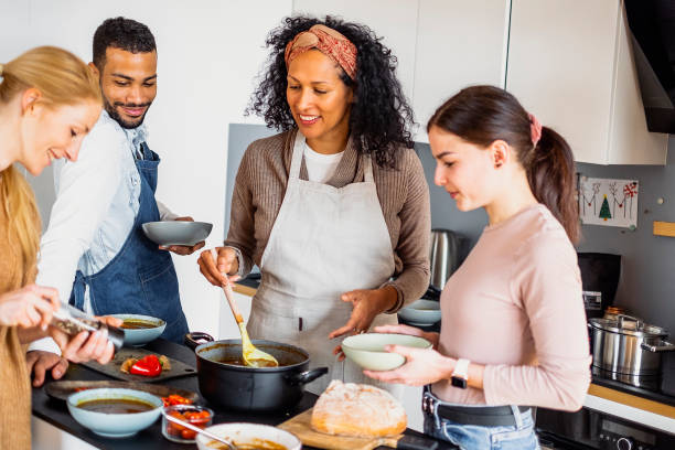 istock Small group of friends preparing food 1471508241