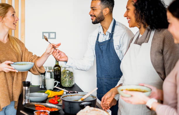 istock Small group of friends preparing food 1471508278