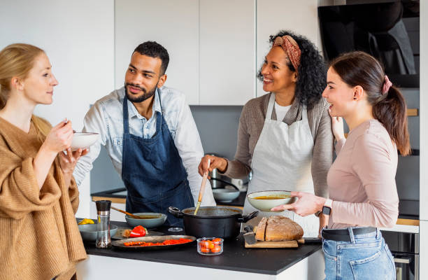 istock Small group of friends preparing food 1471508280