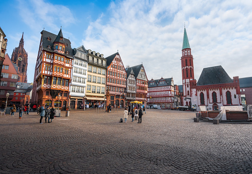Frankfurt, Germany - Jan 23, 2020: Romerberg Square with Old St. Nicholas Church and colorful Half-timbered buildings - Frankfurt, Germany