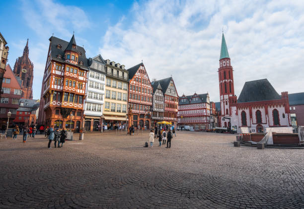 Romerberg Square with Old St. Nicholas Church and colorful Half-timbered buildings - Frankfurt, Germany stock photo