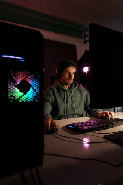 istock Male cybersport gamer playing computer game 1471510003
