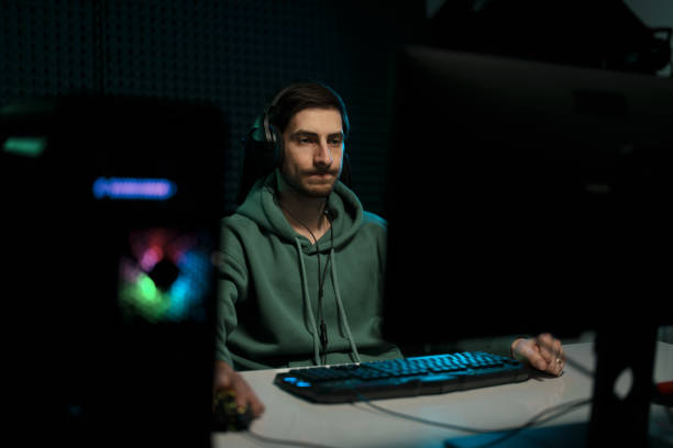 istock Male cybersport gamer playing computer game 1471510028