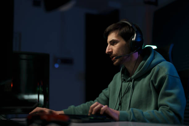 istock Male cybersport gamer playing computer game 1471510035
