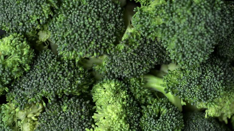 Broccoli slices rotating top view.