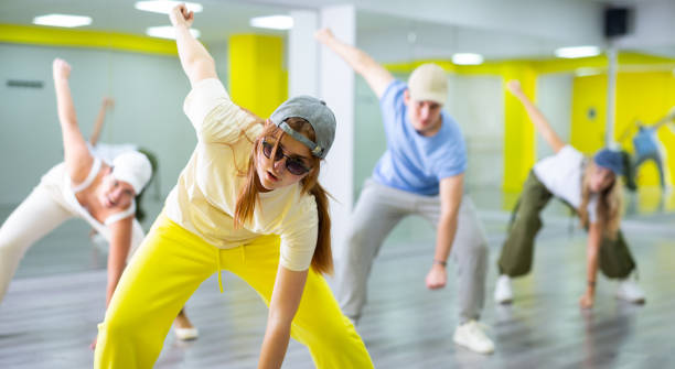 istock Young girl training breakdance drops in dance hall 1471517485