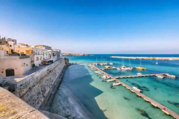 Breathtaking view on harbour of Otranto in Italy with lots of boats and yachts. Italian vacation. Town Otranto, province of Lecce in the Salento peninsula, Puglia, Italy