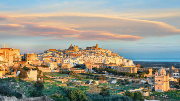 Attractive view on Ostuni white town skyline and Madonna della Grata church Attractive view on Ostuni white town skyline and Madonna della Grata church, Brindisi, Apulia southern Italy. Europe. puglia stock pictures, royalty-free photos & images