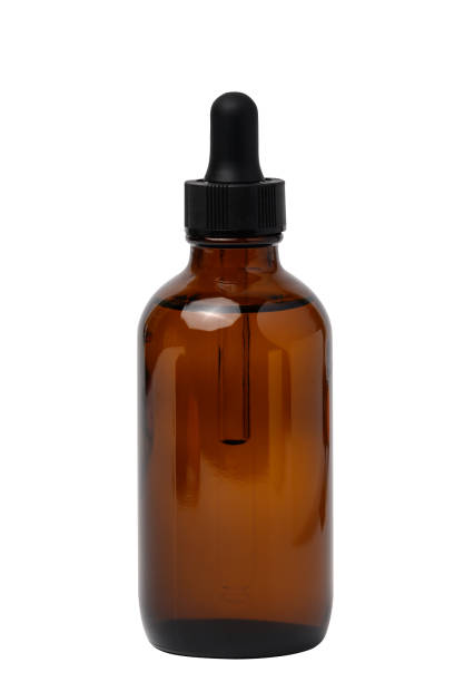 istock A glass brown bottle with a dropper on a white isolated background, a container for cosmetic products 1471521261