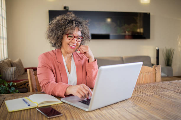 istock Mature woman working from home 1471523908