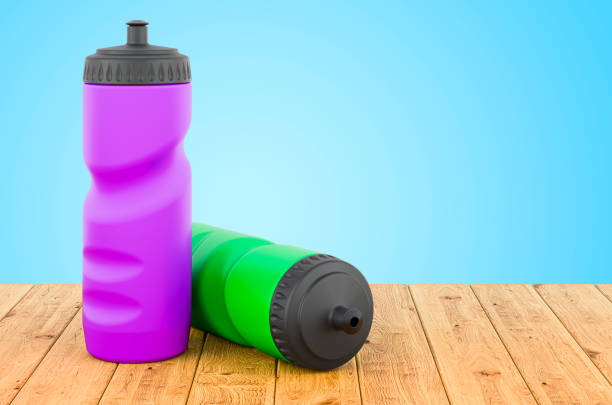 one blue plastic water bottle lies in the pocket of the bag on the bicycle on the street