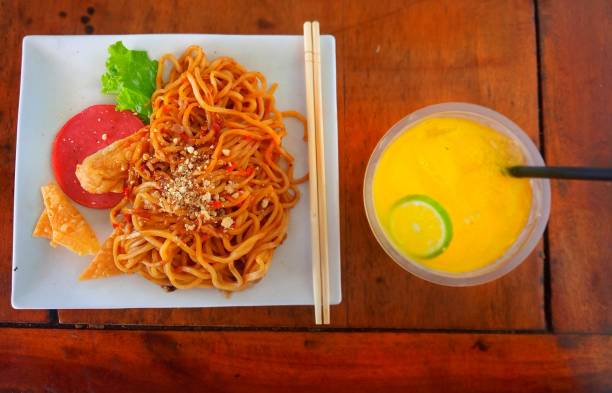 Bakmi Goreng, Indonesian traditional street food, fried noodles cooked with spices typical of Javanese cuisine.