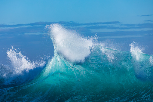 Sea Waves in ocean wave Splashing Ripple Water. Blue water background.