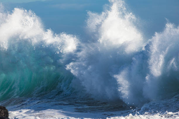 istock Powerful display of ocean waves colliding creating pattern in morning light 1471529856