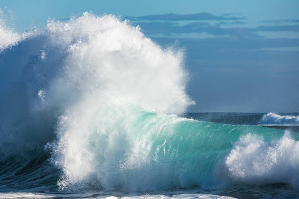 istock Unique display of ocean waves colliding creating pattern in morning light 1471529858
