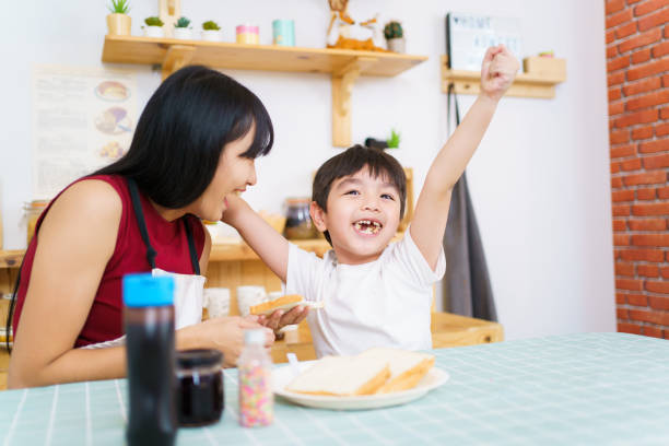 istock Mother and son eating a breakfast. 1471531088