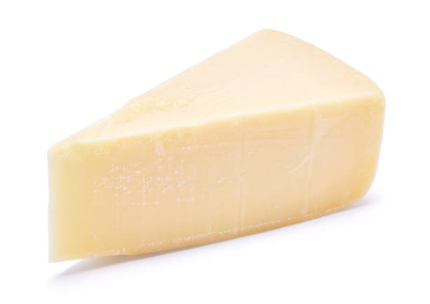 istock Piece of parmesan cheese isolated on white background 1471532016