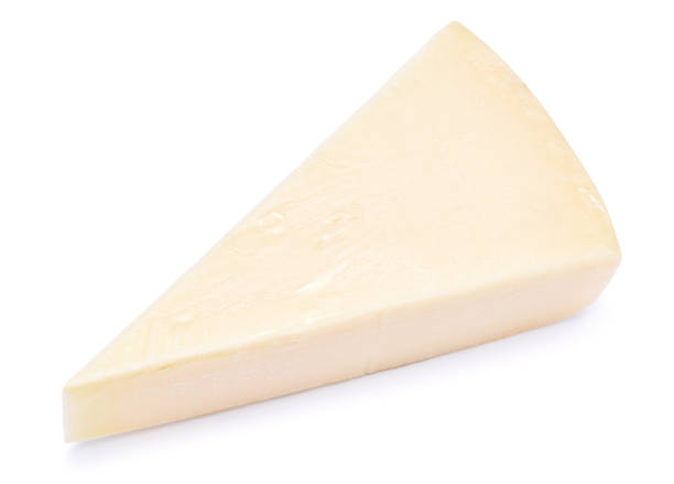 istock Piece of parmesan cheese isolated on white background 1471532021