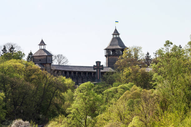 Spring landscape - view of the wooden reconstruction of the Baturyn Citadel, Ukraine Spring landscape - view of the wooden reconstruction of the Baturyn Citadel on the banks of the Seym river, Chernihiv Oblast of northern Ukraine baturyn stock pictures, royalty-free photos & images
