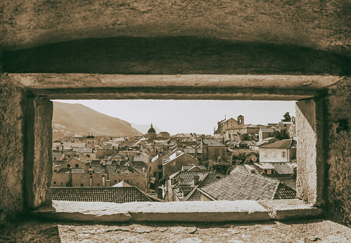 Mediterranean cityscape, in black-and-white color - top view from the fortress tower of the roofs of the Old Town of Dubrovnik, on the Adriatic coast of Croatia