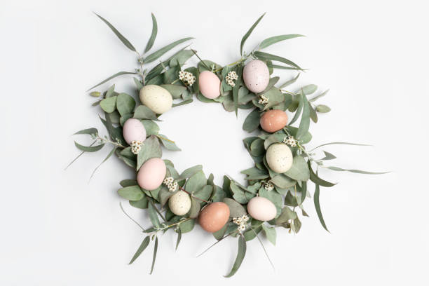 istock Easter Wreath with Easter eggs, eucalyptus leaves and flowers. 1471535369
